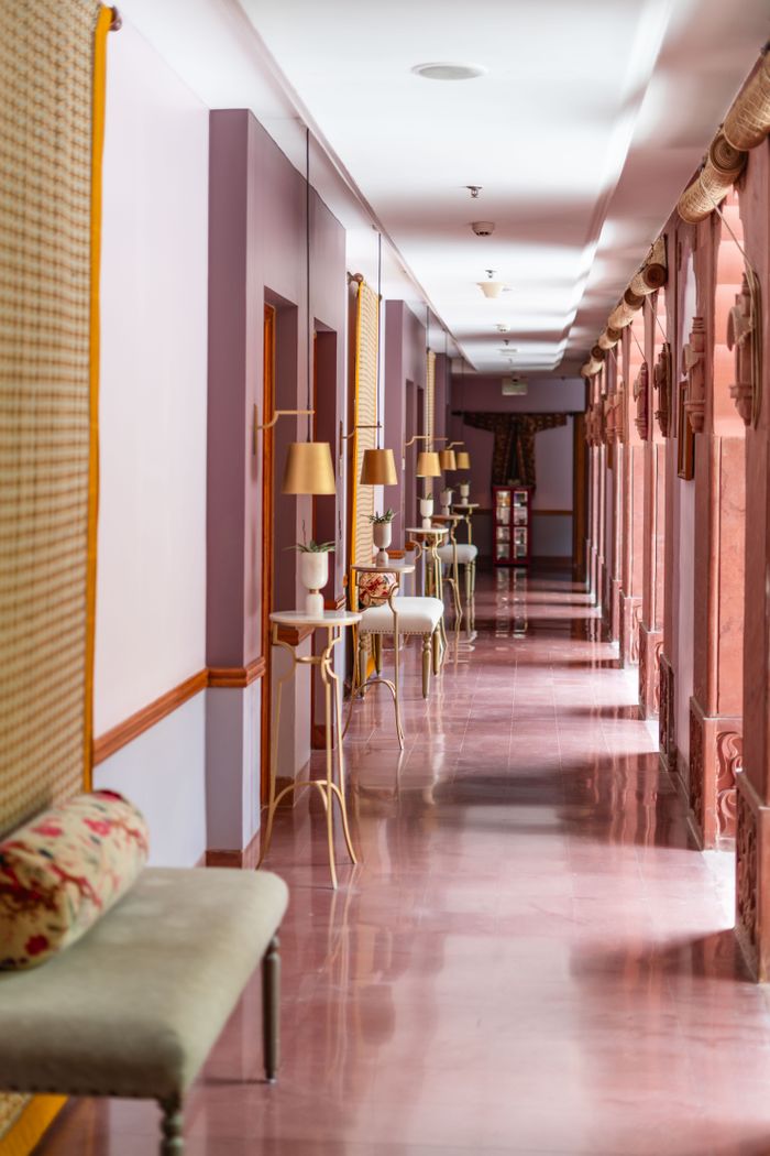 Explore the elegance of a heritage hotel corridor in Bikaner, showcasing luxurious Rajasthani design.