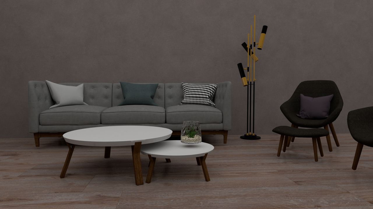 A stylish modern living room with a sofa, chairs, tables, and a unique floor lamp.